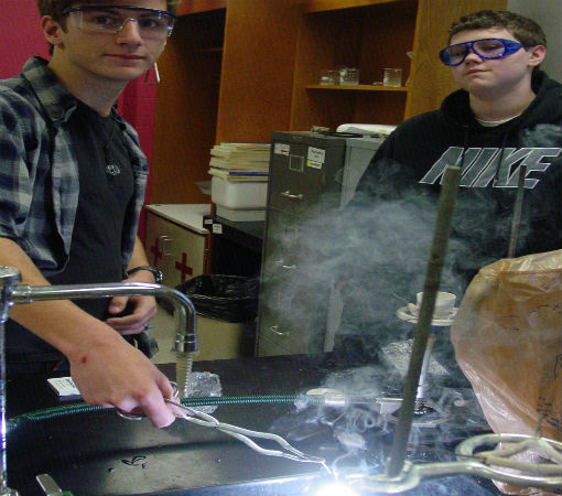 John B and Tristian B burn some magnesium.